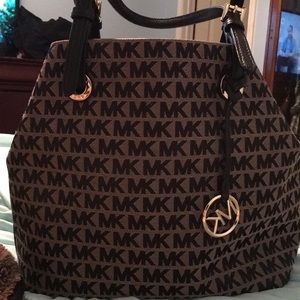 Michael Kors purse bought it in December for $250